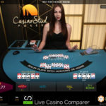 Croupier dealing a live hand of casino stud poker