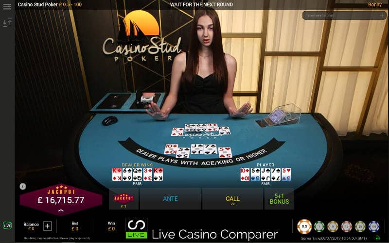 Croupier dealing a live hand of casino stud poker