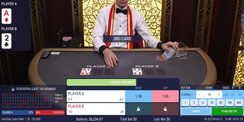 Live dealer placing the third card, triggering a change in the betting percentages