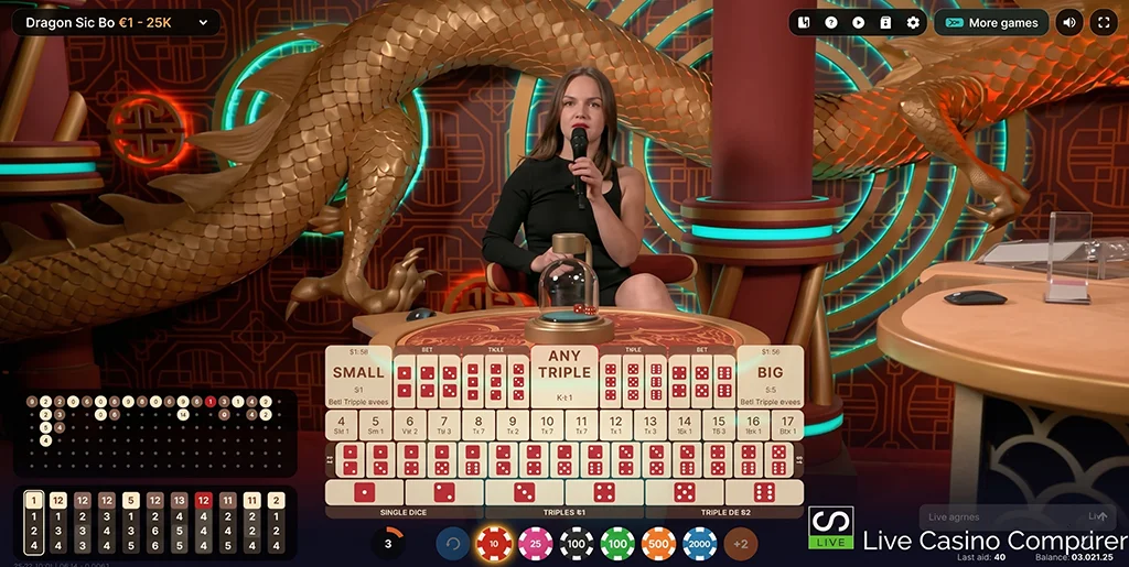 Live dice game action on the ICONIC21 Sic Bo table