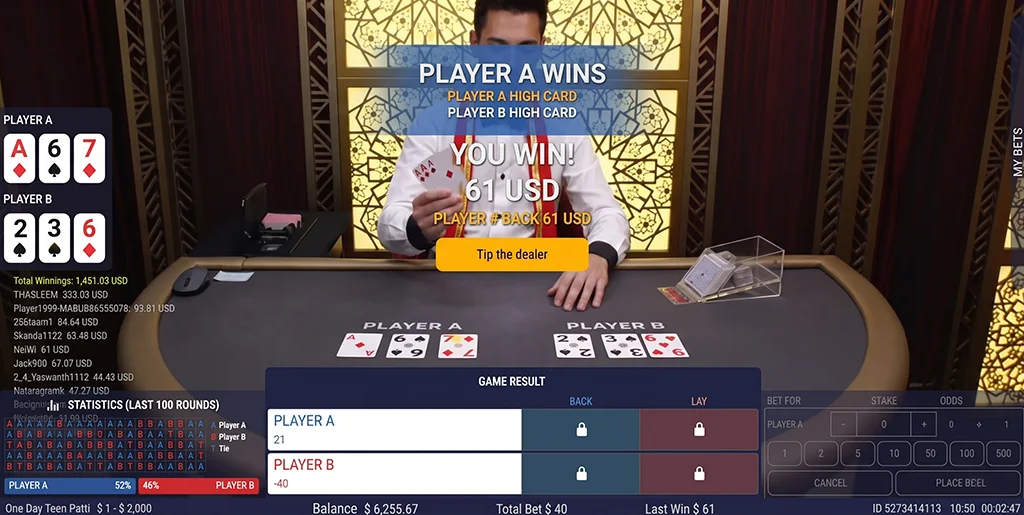 Winner announcement overlay highlighting the successful hand on the table